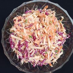 A picture of White and purple cabbage coleslaw.