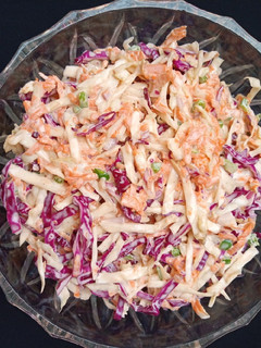 A picture of White and purple cabbage coleslaw.