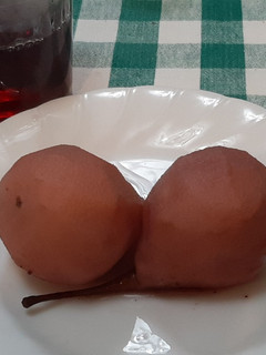 Una foto de Peras al vino
