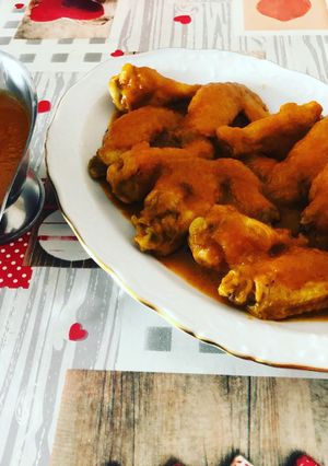 Una foto de Alitas de pollo en salsa jardinera pasada por colador chino