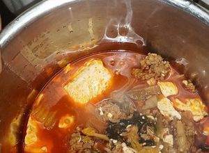 Gambar Beef Kimchi Sundubu Jjigae (Spicy Soft Tofu Stew with Beef and Kimchi)