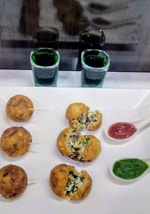 A picture of Cheese spinach potato croquet.