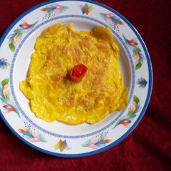 A picture of Scrambled egg.(with dress of tomato rose).