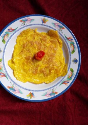 A picture of Scrambled egg.(with dress of tomato rose).