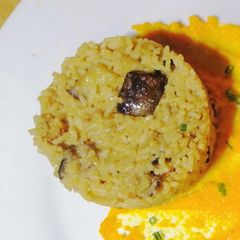 A picture of Korean egg fried rice with eggplant/brinjal.