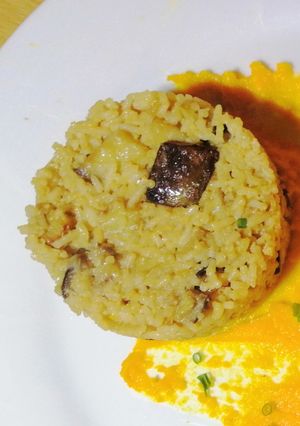 A picture of Korean egg fried rice with eggplant/brinjal.