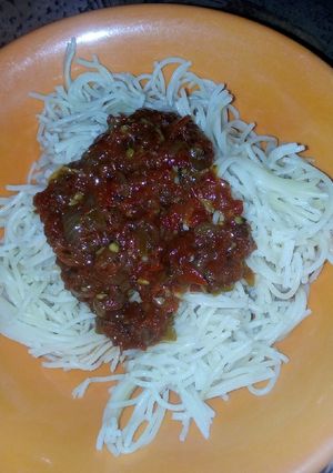 A picture of Spaghetti with sauce.