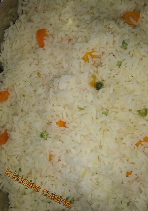 A picture of Carrot,peas rice.