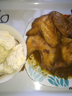 A picture of Tapioca (kpokpo garri) and local chicken sauce.