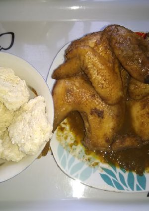 A picture of Tapioca (kpokpo garri) and local chicken sauce.