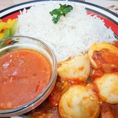 A picture of Egg curry served with rice#localfoodcontest-NairobiNorth.