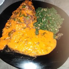 A picture of Stewed fish with spinach.