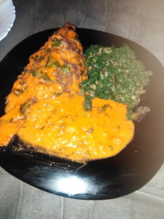 A picture of Stewed fish with spinach.