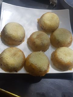Una foto de Masaco de plátano de freír acompañado con un delicioso café😋😋