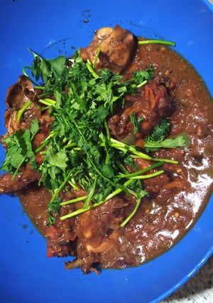 A picture of Marinaded chicken with sauce.