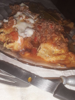 Una foto de Canelones de acelga con salsa bolognesa
