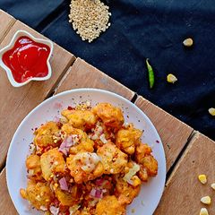 A picture of Pizza flavour skinned black gram corn fritters.