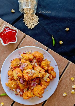A picture of Pizza flavour skinned black gram corn fritters.