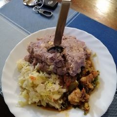 A picture of #themechallenge arrow roots, beans and maize mukimo served beef.