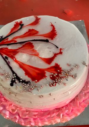A picture of Chocolate Thread Cake with Vanilla Icing.