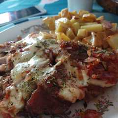 Una foto de Vacío de cerdo a la pizza