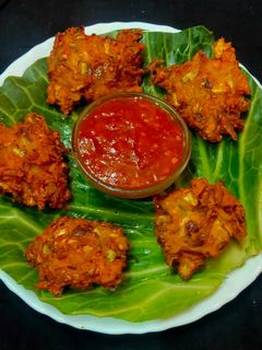 पत्तागोभी के कुरकुरे पकौड़े (patta gobi ke kurkure pakode recipe in hindi) रेसिपी मुख्य फोटो