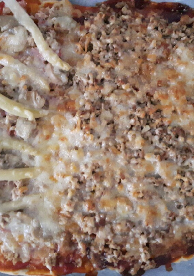 Una foto de Pizza 100% casera