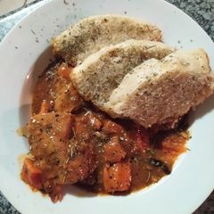 A picture of Chicken Curry with Sweet Potatoes and Homemade Dombolo without yeast.
