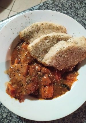 A picture of Chicken Curry with Sweet Potatoes and Homemade Dombolo without yeast.