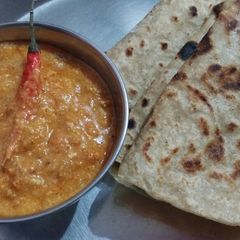 A picture of Tomato and peanut chutney.