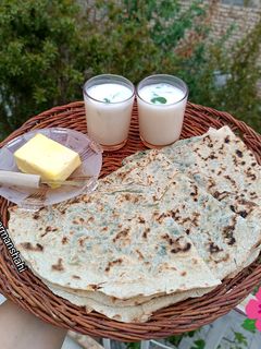 عکسی از دستور نان کلانه (پیچک) روی ساج