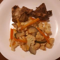 A picture of Cauliflower with grilled chicken.