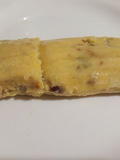 Una foto de Tamal de maíz tierno