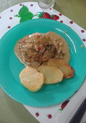 Una foto de Pechuga de pollo al vino blanco