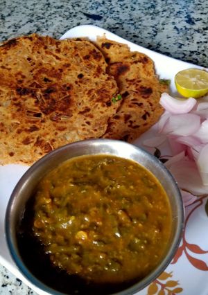 A picture of Sindhi sai bhaji spinach with veggies and Bengal gram Dal.