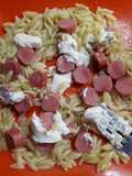 Riso con salchichas y queso crema