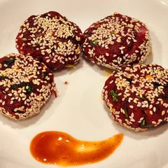 A picture of Beetroot Tikki or Patties with Sesame Seeds.