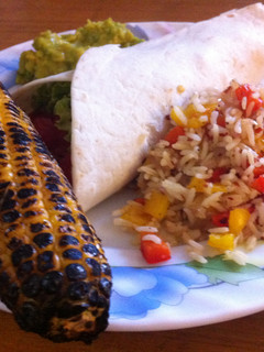 A picture of Tortillas with Refried Beans and Spicy Rice.