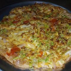A picture of Roti egg paratha with veggies.