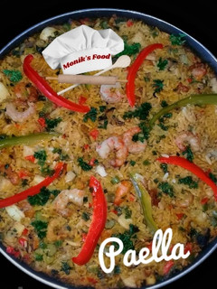 Una foto de Paella