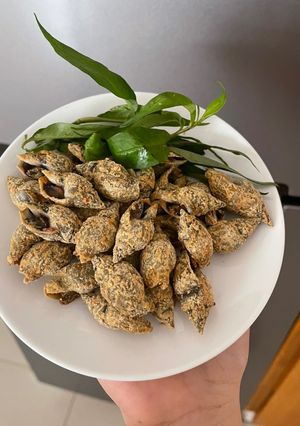 Hình của món Ốc cà na rang muối.