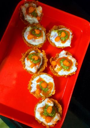 A picture of Baked Aloo Katori chaat.