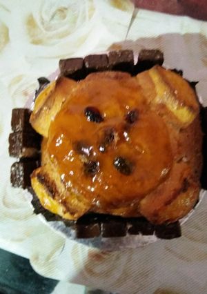 A picture of Raskadam cake with mango jelly toping.