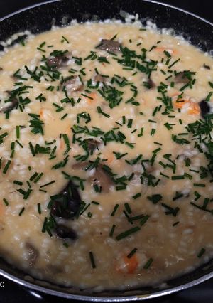 Una foto de Risotto de langostinos y mix de setas