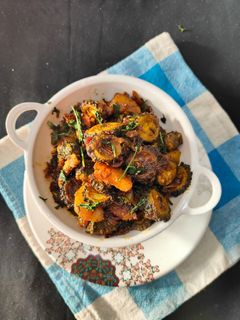 गोल करेले 🍲 की सब्जी रेसिपी मुख्य फोटो