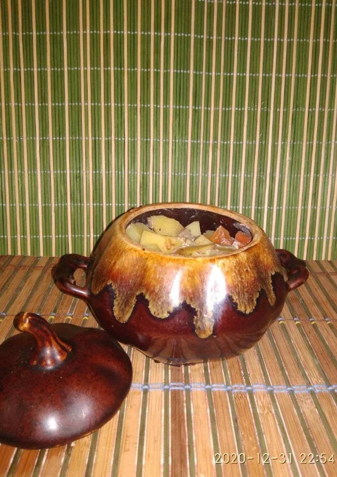Картопля в горщиках