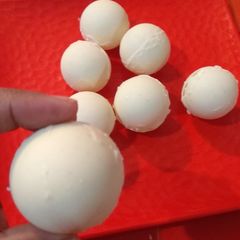 A picture of White chocolate sphere ball.