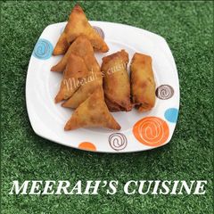 A picture of Samosa & spring roll.