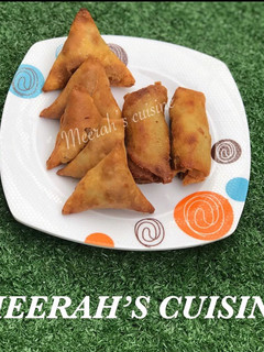 A picture of Samosa & spring roll.