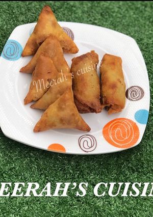 A picture of Samosa & spring roll.